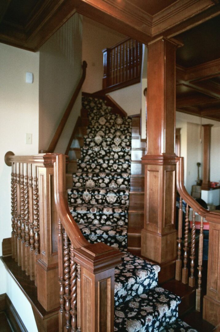 Split stair with custom oak rail system