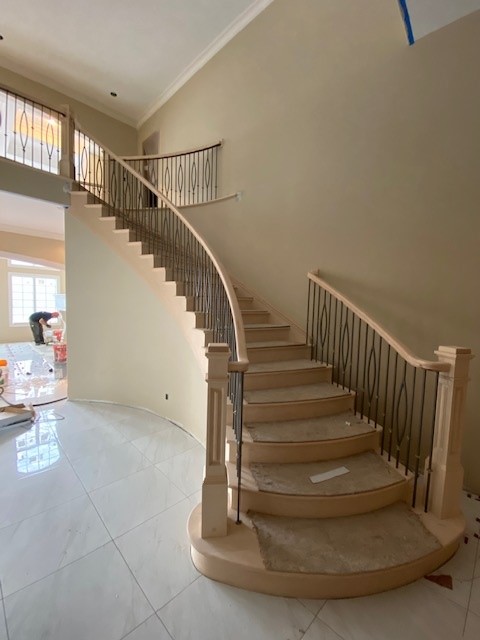 Curved Maple Rail With Eyebrow Balusters
